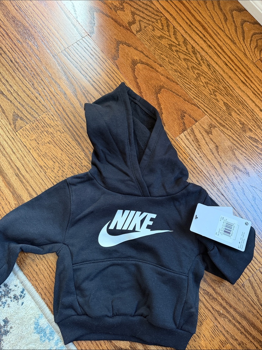 Nike Black Hoodie with White Swoosh Logo